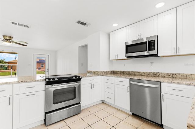 1057 TROPICAL AVENUE NW, Port Charlotte, FL 33948