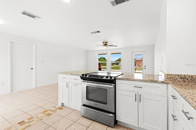 1057 TROPICAL AVENUE NW, Port Charlotte, FL 33948