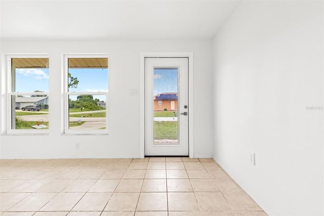 1057 TROPICAL AVENUE NW, Port Charlotte, FL 33948