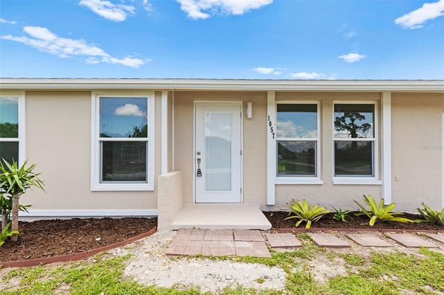 1057 TROPICAL AVENUE NW, Port Charlotte, FL 33948