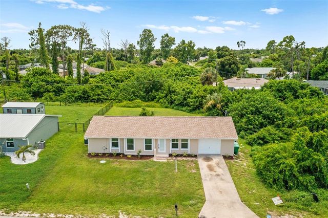 1057 TROPICAL AVENUE NW, Port Charlotte, FL 33948