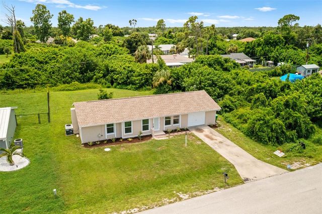 1057 TROPICAL AVENUE NW, Port Charlotte, FL 33948