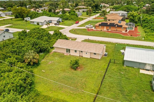 1057 TROPICAL AVENUE NW, Port Charlotte, FL 33948