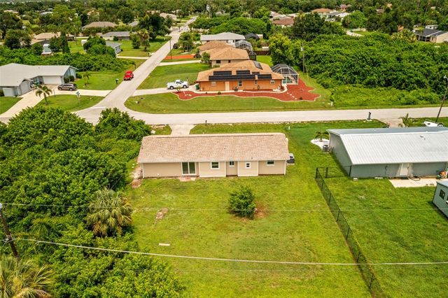 1057 TROPICAL AVENUE NW, Port Charlotte, FL 33948