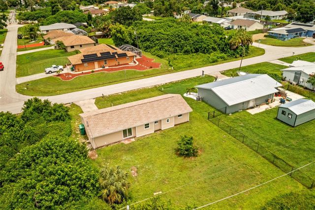 1057 TROPICAL AVENUE NW, Port Charlotte, FL 33948