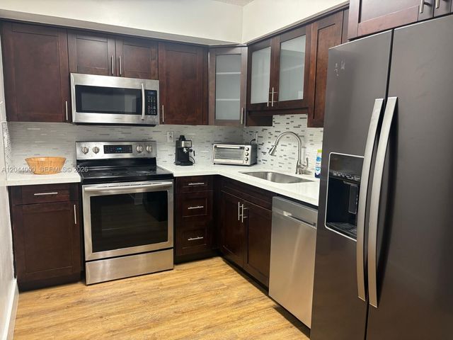 3300 NE 191st St 211, Aventura, FL 33180