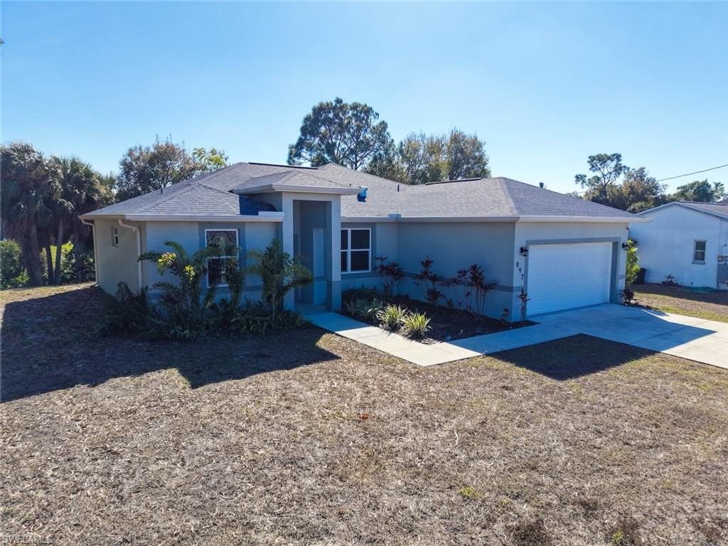 897 Iris DR, NORTH FORT MYERS, FL 33903 — photo 2