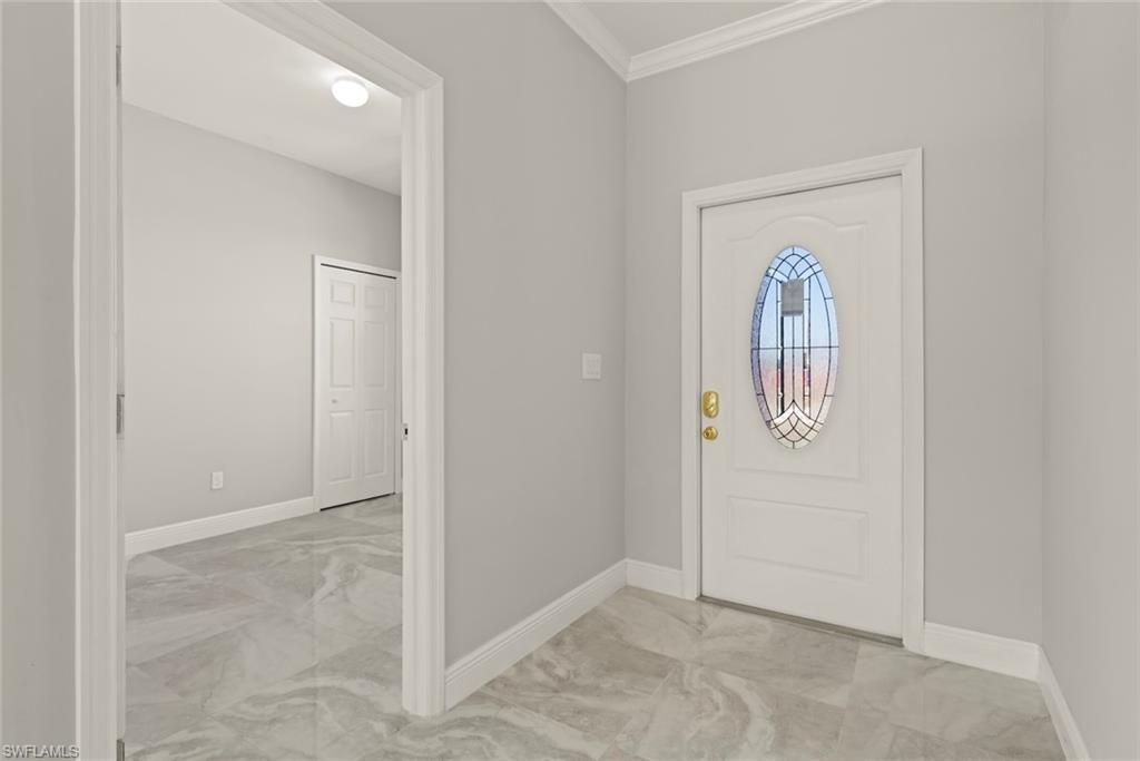 897 Iris DR, NORTH FORT MYERS, FL 33903 — photo 4