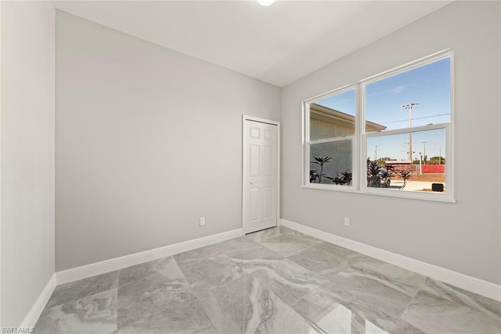 897 Iris DR, NORTH FORT MYERS, FL 33903 — photo 5