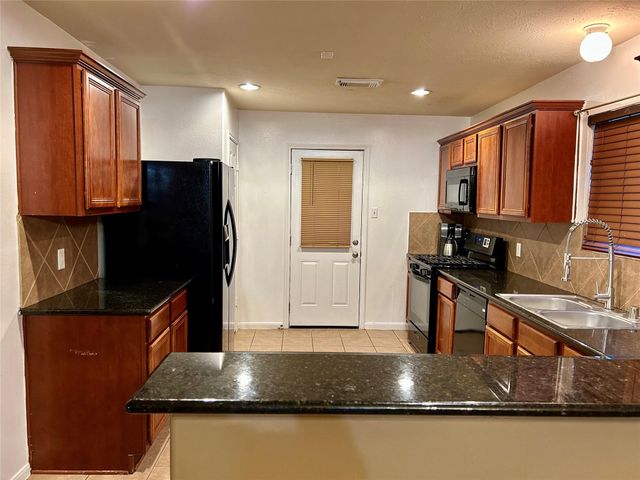 10806 Tobar Falls Circle, Houston, TX 77064