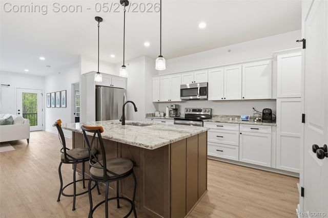 606 Pointe Drive, Walled Lake, MI 48390