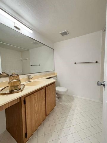 1005 Palm Beach Trace Drive 1005, Royal Palm Beach, FL 33411