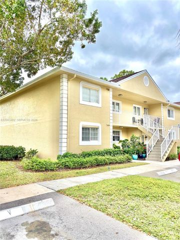 1005 Palm Beach Trace Drive 1005, Royal Palm Beach, FL 33411