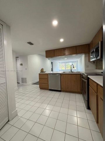 1005 Palm Beach Trace Drive 1005, Royal Palm Beach, FL 33411