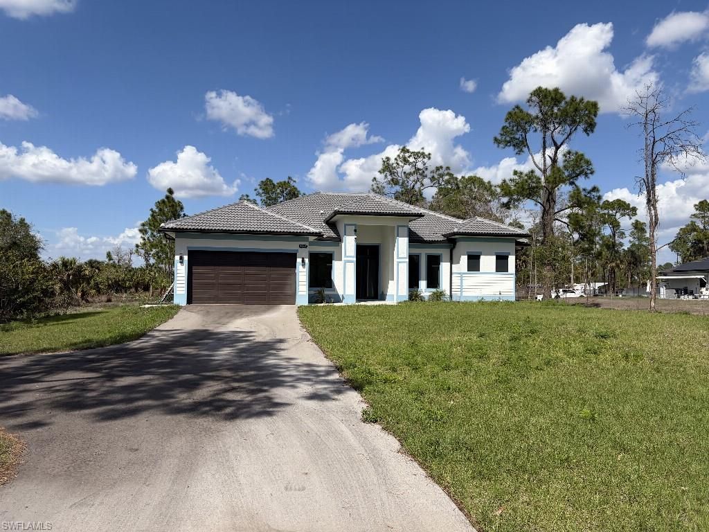 3943 16th AVE NE, NAPLES, FL 34120 — photo 2