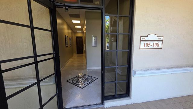 7301 Wiles Road 107, Coral Springs, FL 33067