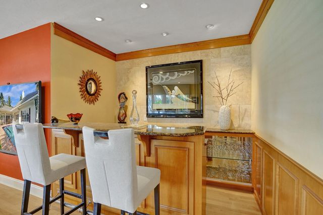 7 Saranac Road, Sea Ranch Lakes, FL 33308