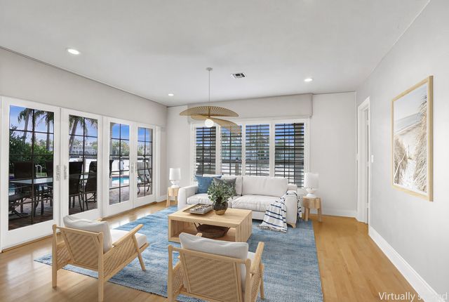 7 Saranac Road, Sea Ranch Lakes, FL 33308
