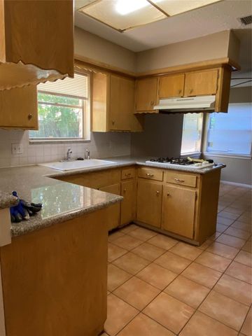 9711 S Petersham Drive, Houston, TX 77031
