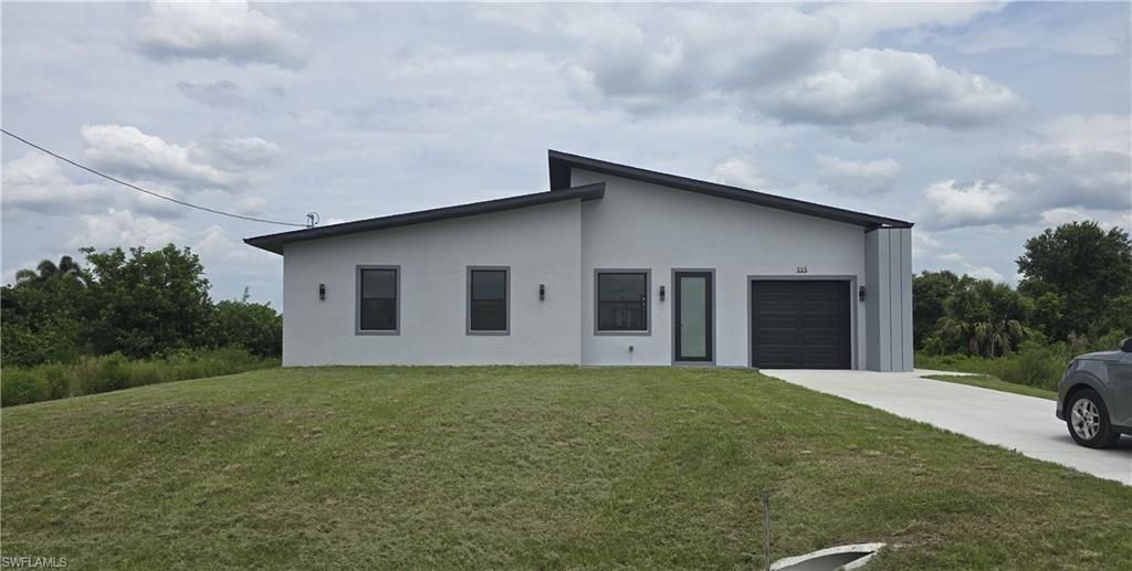 515 CROYDON AVE S, Lehigh Acres, FL 33974