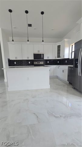 761 Bell BLVD S, Lehigh Acres, FL 33974