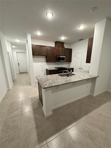 7004 BROAD WING LOOP, Howey In The Hills, FL 34737