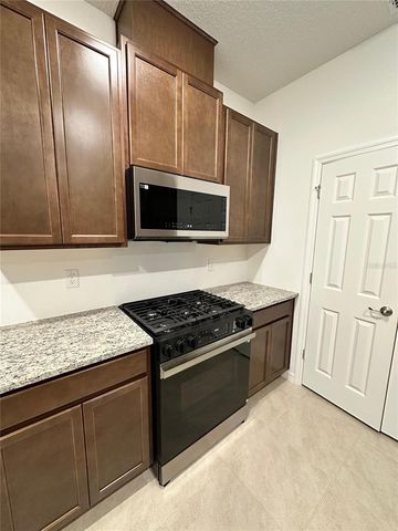 7004 BROAD WING LOOP, Howey In The Hills, FL 34737