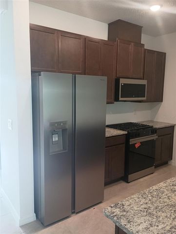 7004 BROAD WING LOOP, Howey In The Hills, FL 34737