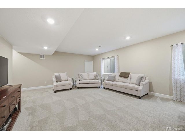 744 Penstemon Dr, Henderson, CO 80640