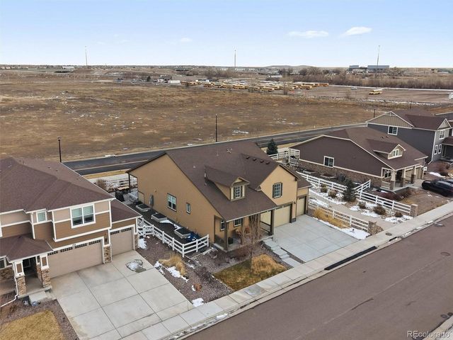 744 Penstemon Dr, Henderson, CO 80640