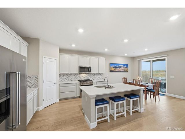 744 Penstemon Dr, Henderson, CO 80640