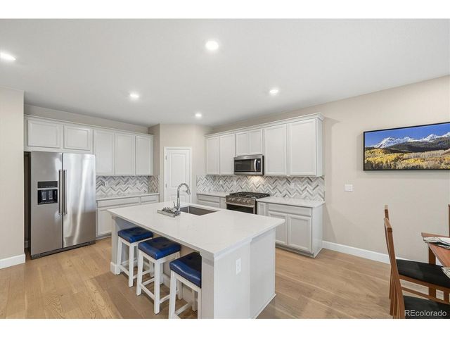 744 Penstemon Dr, Henderson, CO 80640