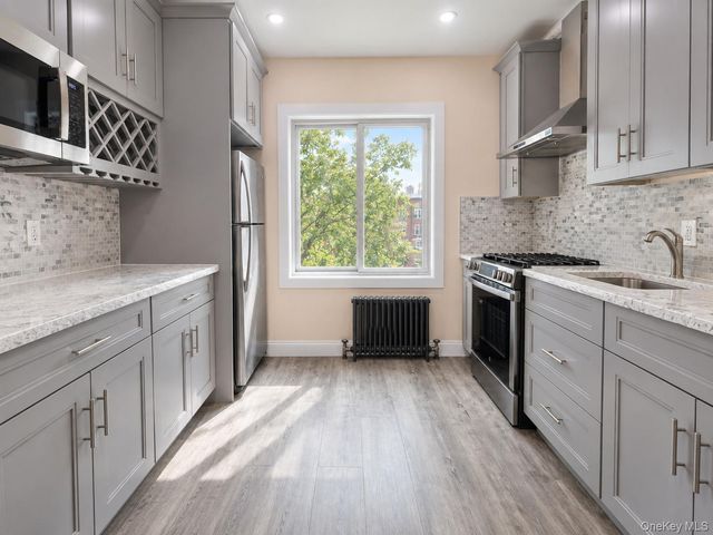 9906 67th Avenue, Rego Park, NY 11374