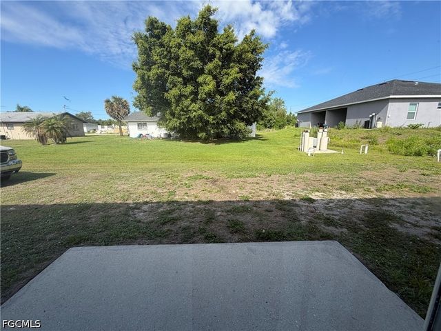 704 Gilbert AVE S, Lehigh Acres, FL 33973