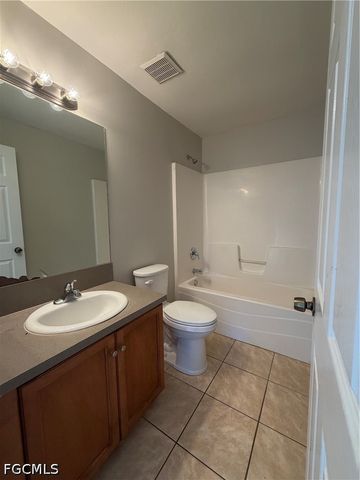 704 Gilbert AVE S, Lehigh Acres, FL 33973