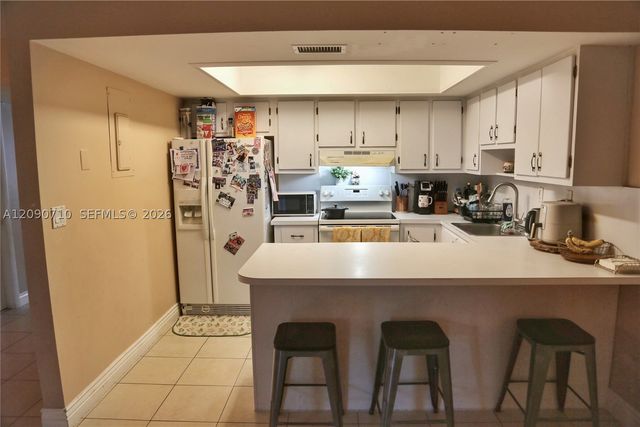 40 Pleasant Hill Ln 40, Tamarac, FL 33319