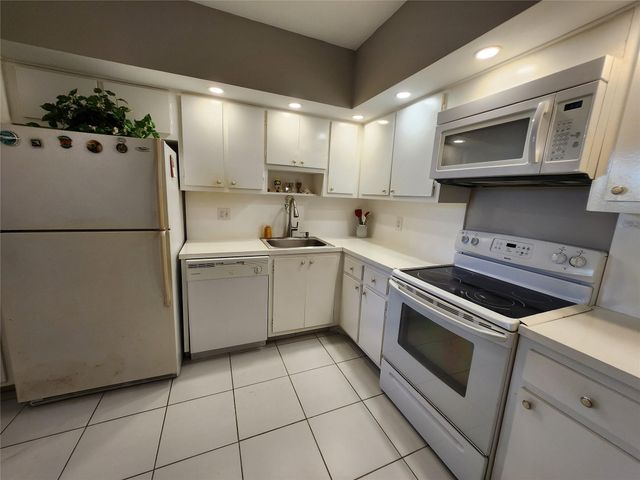 4030 W Palm Aire Drive 101, Pompano Beach, FL 33069