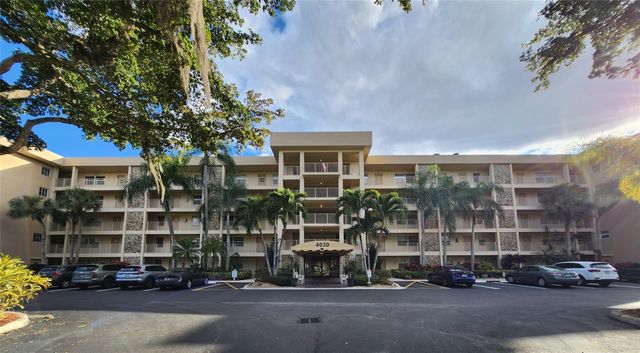 4030 W Palm Aire Drive 101, Pompano Beach, FL 33069