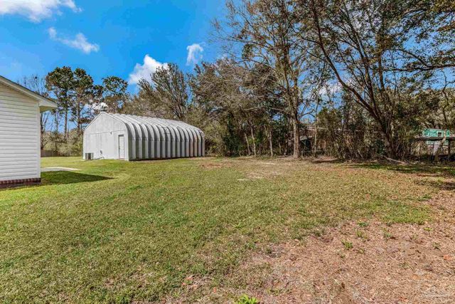 902 Heathrow Dr, Cantonment, FL 32533