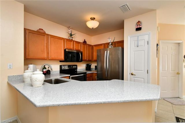 8676 Athena CT, Lehigh Acres, FL 33971