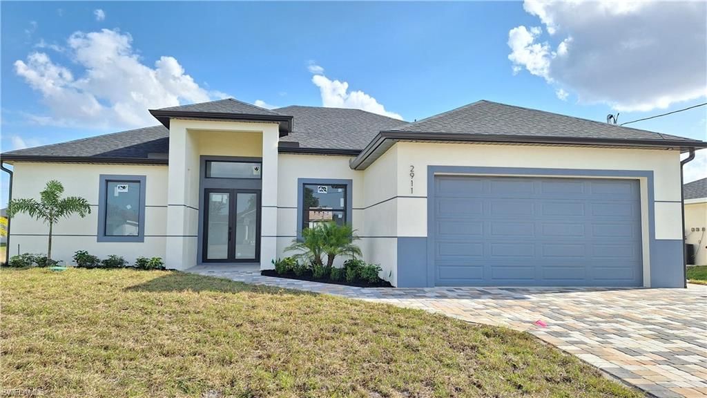 2911 22nd ST SW, LEHIGH ACRES, FL 33976 — exterior