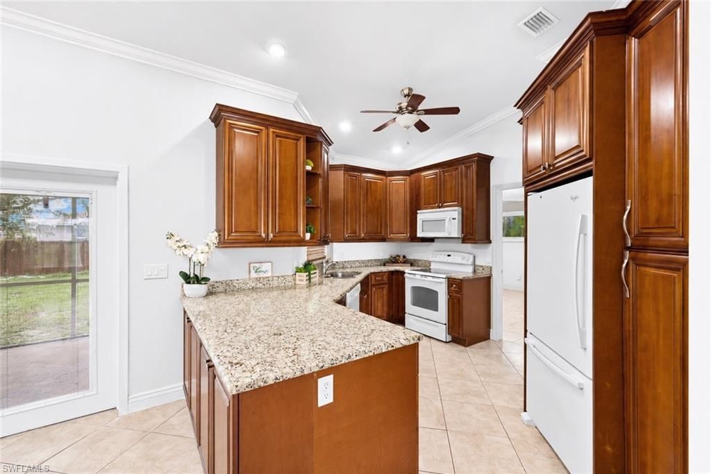 1121 NW 9th ST, CAPE CORAL, FL 33993 — photo 2