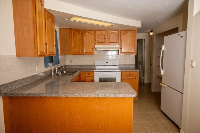 1203 BRIGHTWELL DRIVE, Holiday, FL 34690