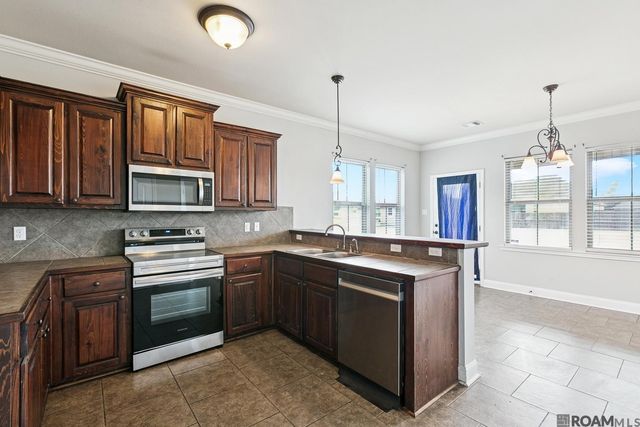 3883 Plantation Ridge Dr, Addis, LA 70710