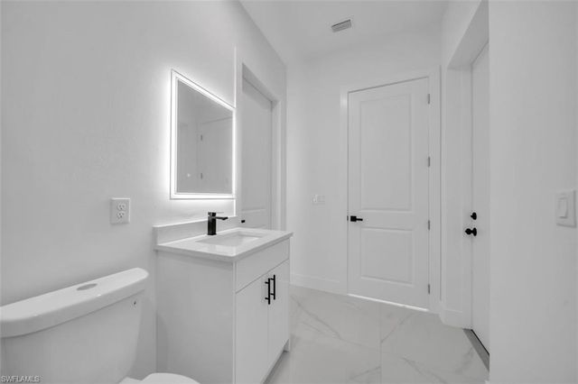 637 Summit AVE S, Lehigh Acres, FL 33974