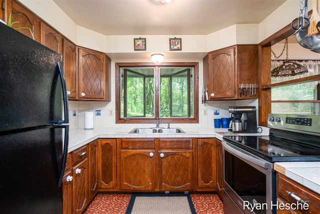 8775 Peck Lake Road, Saranac, MI 48881