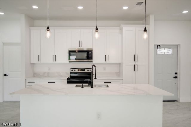 1020 Carroll ST E, Lehigh Acres, FL 33974