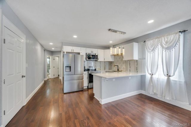 9411 210th Street, Queens Village, NY 11428