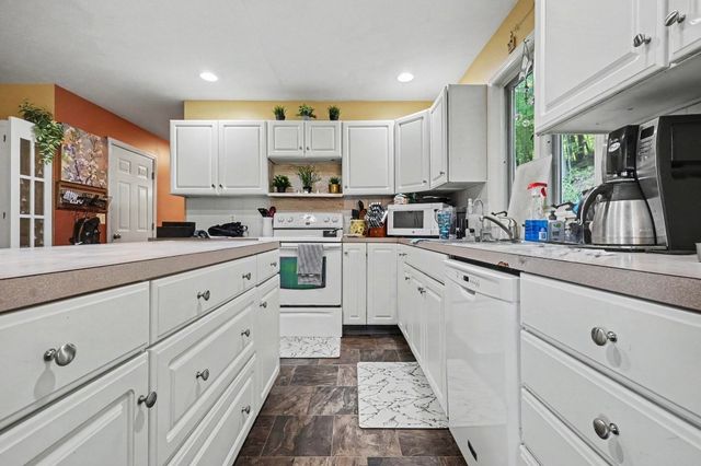 8824 Grand River Drive SE, Ada, MI 49301