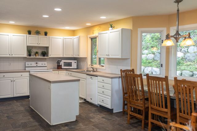 8824 Grand River Drive SE, Ada, MI 49301